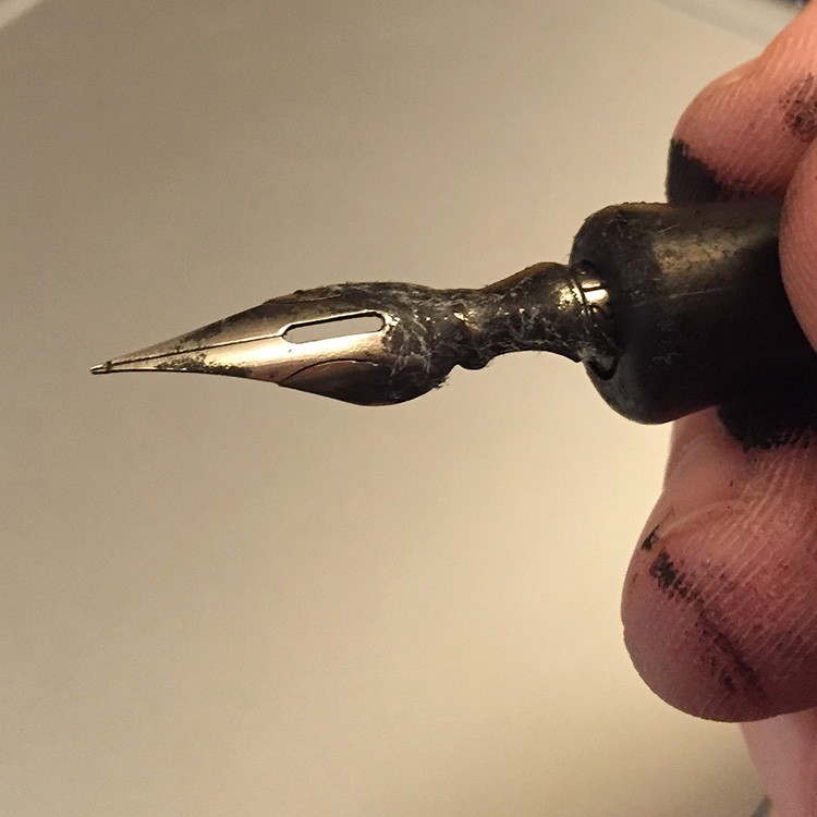 The nib has a rounded top and should be held like this. It can be bent, and that ruins it, so be gentle. If you notice a split in the nib, that is how the ink travels to the tip, and all nibs are split like this.