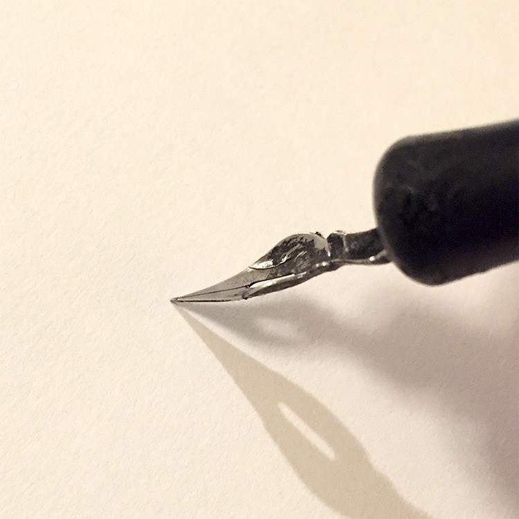 This is upside down! A nib held like this will scratch up your paper and not work very well.
